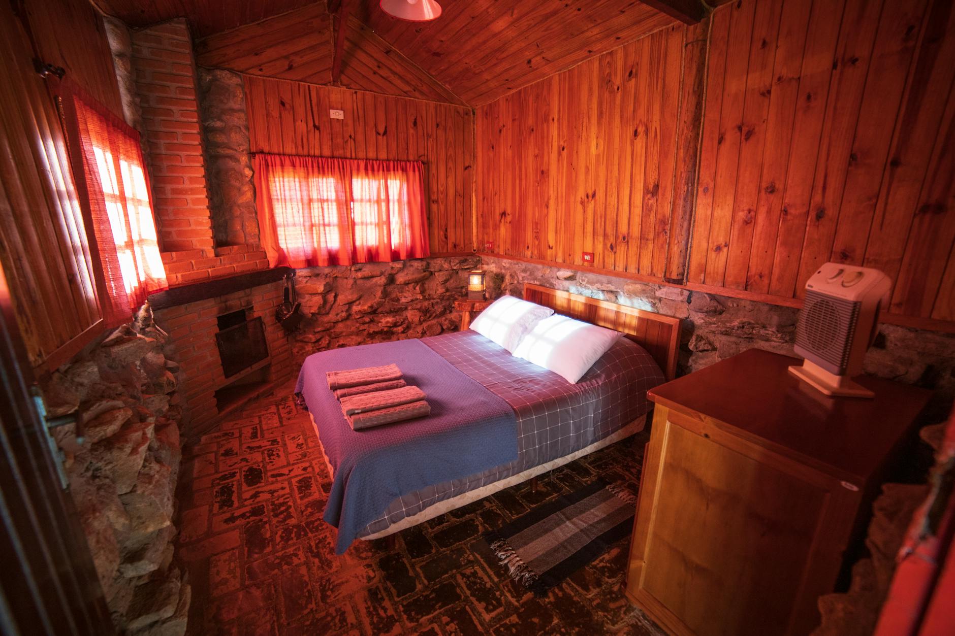 Interior of a cozy ski lodge room with winter view-photo-by-pexels