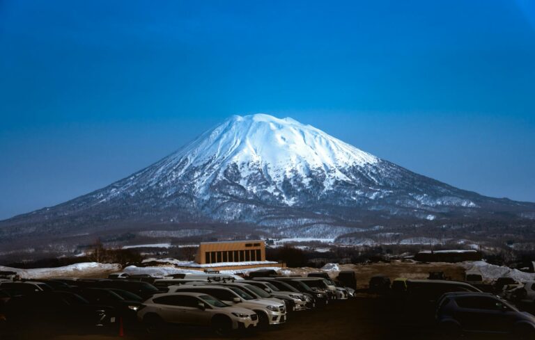 Panoramic view of Mount Yotei and Niseko ski resort with snowy slopes and village in foreground-photo-by-pexels