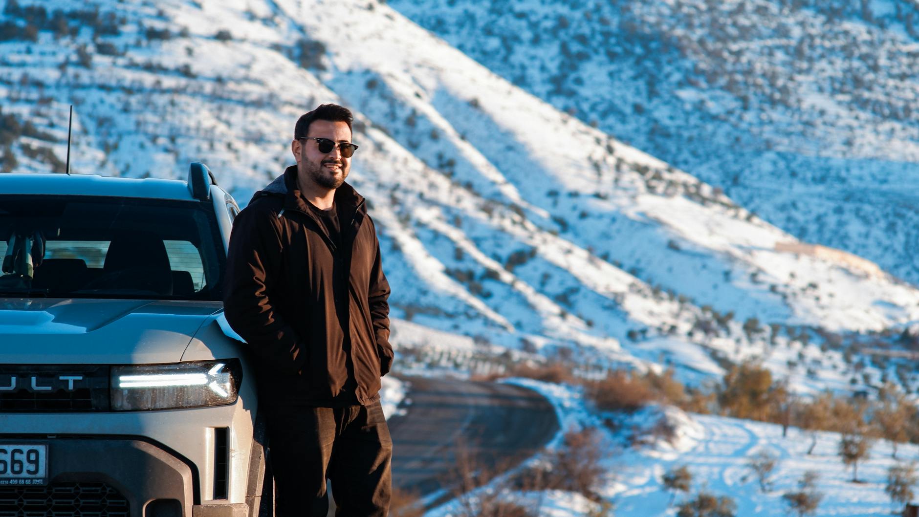 Winding winter road leading up to a ski resort-photo-by-pexels